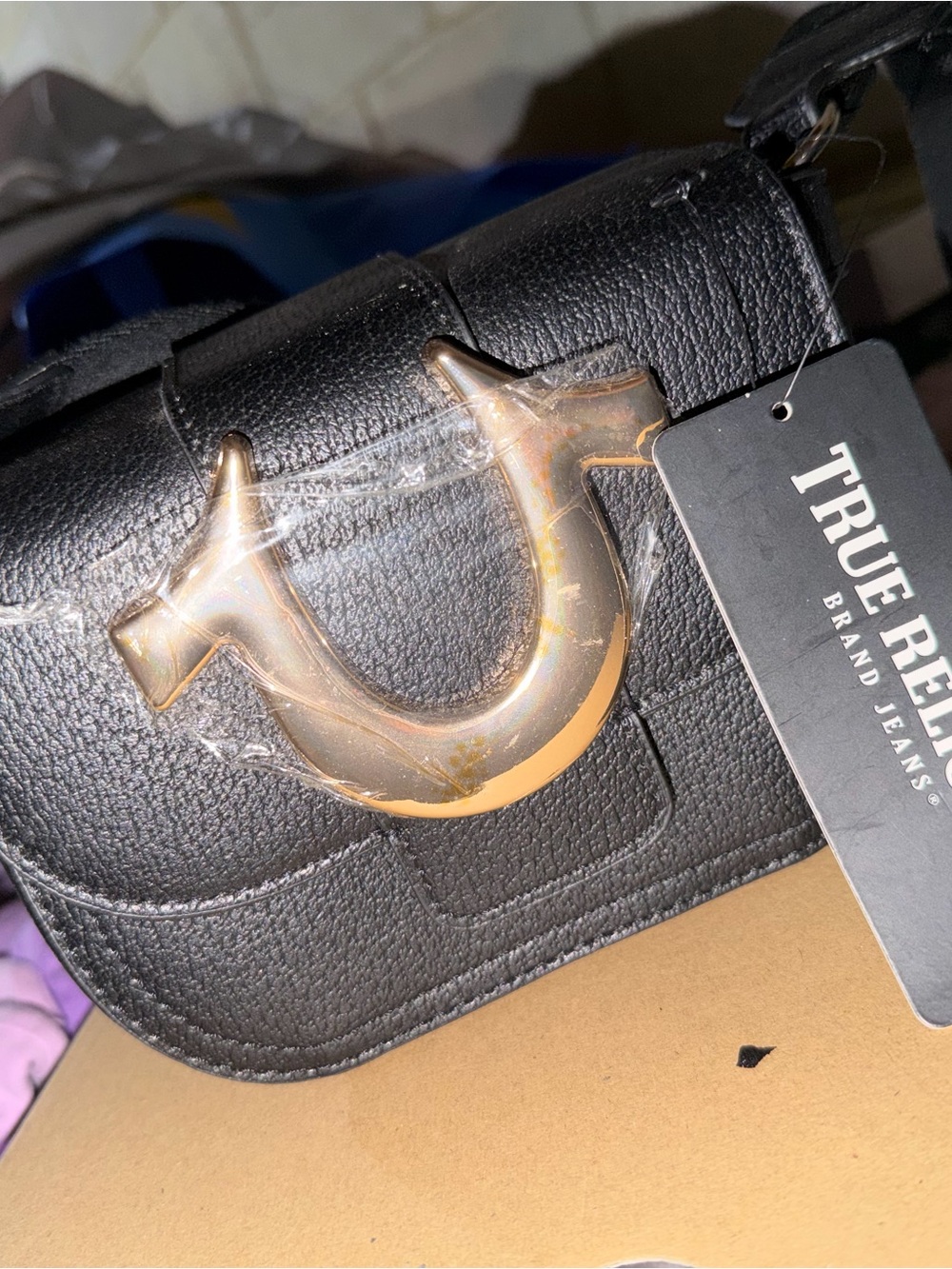 True Religion Black Leather Crossbody with Gold Horseshoe Accent